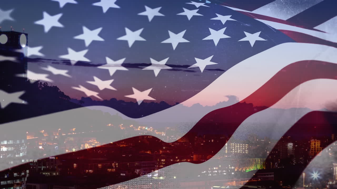 都市を背景にしたアメリカ国旗のアニメーション