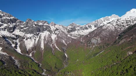 colorful mountain panoramic view of alpine valley in spring