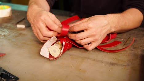 artisan creating leather goods