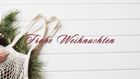 frohe weihnachten text in red over shopping bag with christmas bracnhes on white wood background