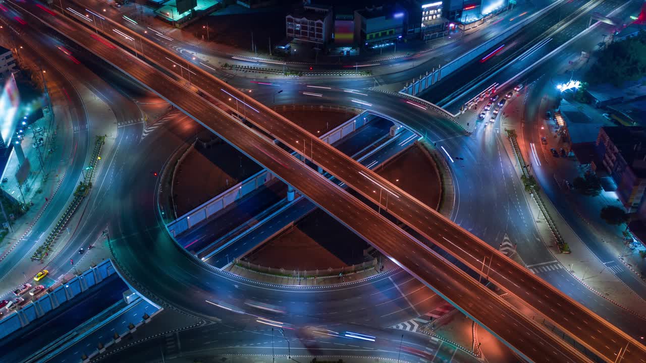 Time lapse,Hyperlapse ,Of traffic on city streets at night. Aerial view and top view of traffic on freeway.