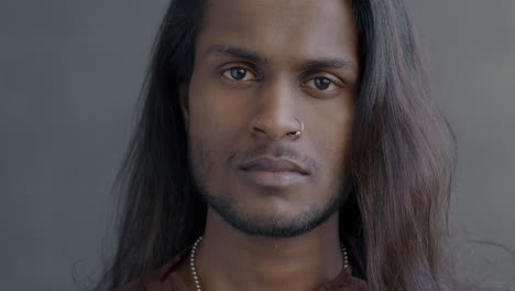 portrait of a man with long hair