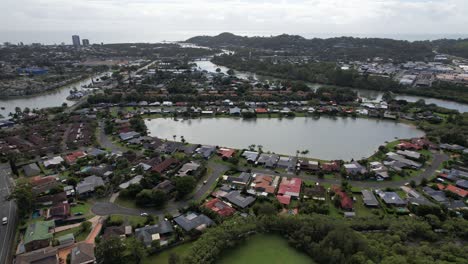 suburban homes around currumbin creek in currumbin waters, queensland, australia