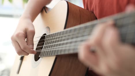 cuban man playing guitar closeup