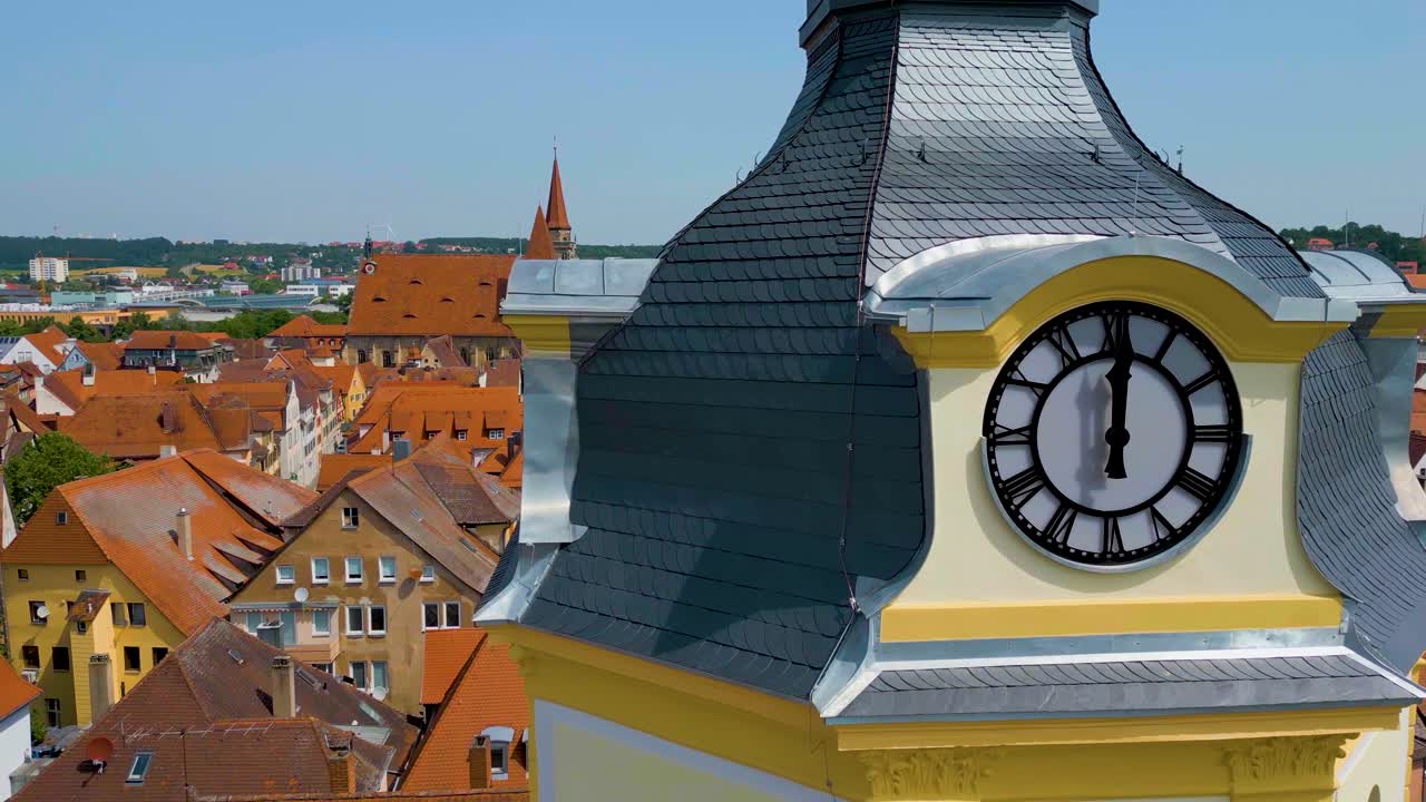 4K Aerial Drone Video of the Clock Tower, St. Johannis Kirche Church, and Kirche St. Gumbertus Church in Ansbach, Germany