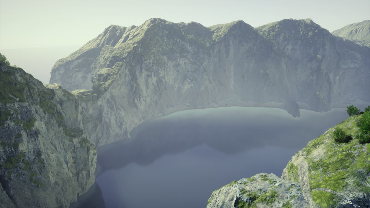 Majestic mountain landscape with tranquil water reflecting sunlight