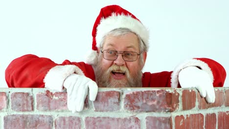 santa claus climbing up a chimney