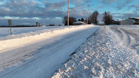 winter snow drifts along rural country road