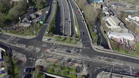 Aerial-footage-of-the-A50,-A500-motorway,-dual-carriage-way-in-the-heart-of-the-city-of-Stoke-on-Trent-in-Staffordshire,-Commuters-travel-north-and-south-on-the-roads