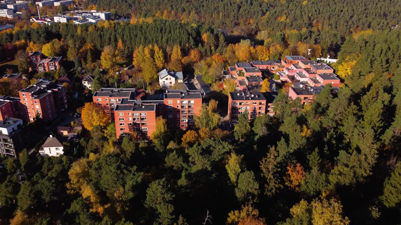 AERIAL Shot of a Colorful Forested Residential Area with Apartment Buildings in Antakalnis District, Vilnius, Lithuania