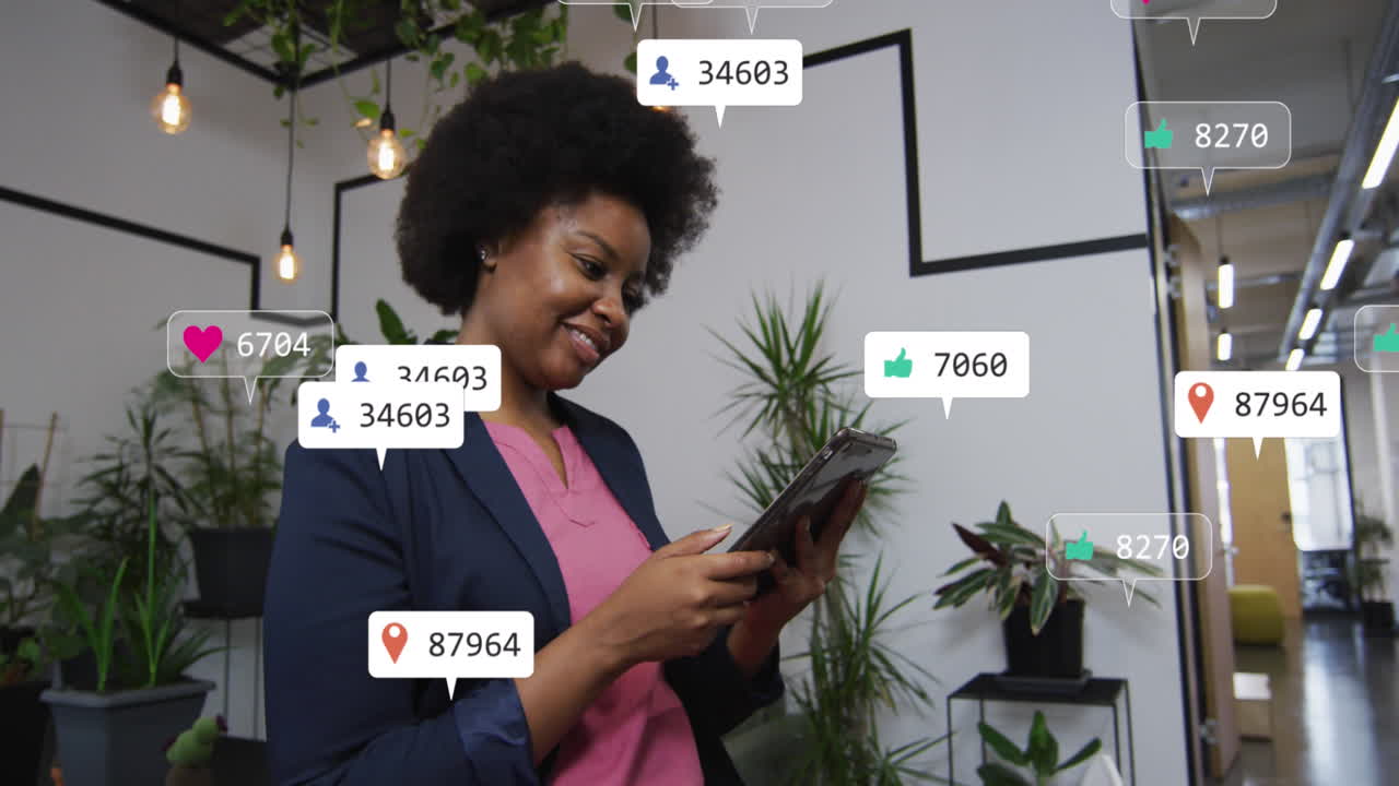 Animation of social media data processing over african american businesswoman in office