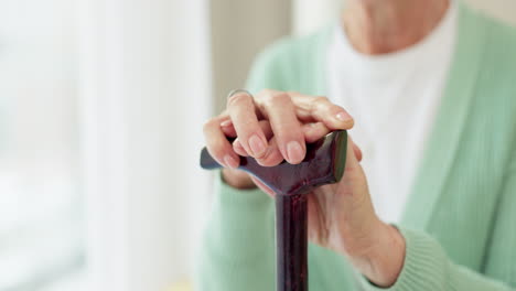 cane, retirement and support with hands of old