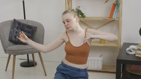 woman practicing yoga at home