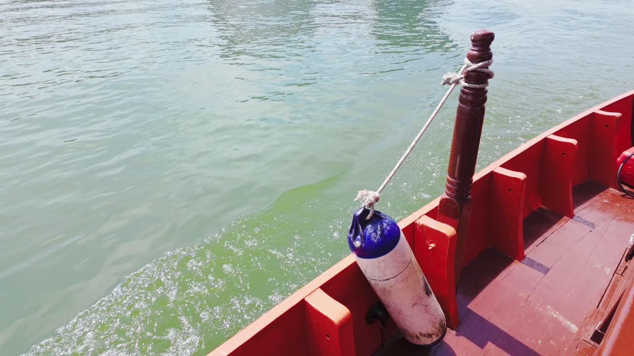 Closeup of water ocean wave ripples boat ride in at day