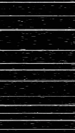 Abstract video concept with a close-up view of black and white static noise, resembling a vintage