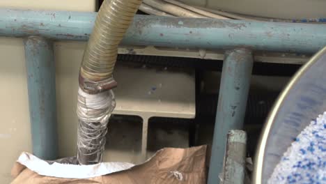 vacuum pipe sucking plastic on factory