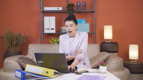 home office worker young woman having a heart attack.