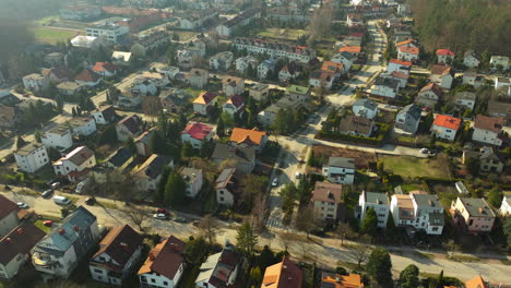 Overlooking-a-sprawling-residential-area-from-above,-the-image-captures-the-density-of-housing,-the-main-thoroughfare-bisecting-the-neighborhood,-and-the-interaction-of-urban-development---Gdynia