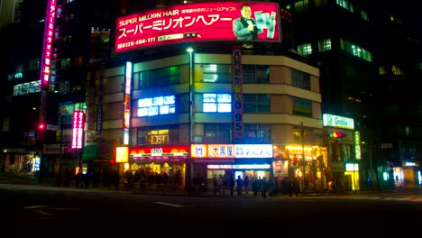 night lapse with japanese neons at south shinjuku wide shot right panning