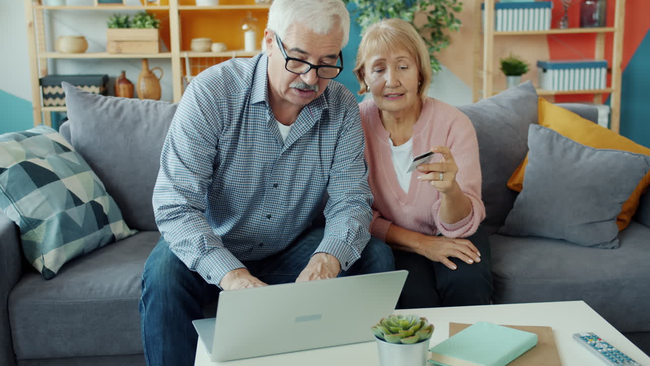 Elderly Couple Shopping Online