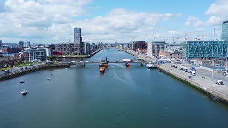 aerial approach to tom clarke bridge in dublin with view over dublin