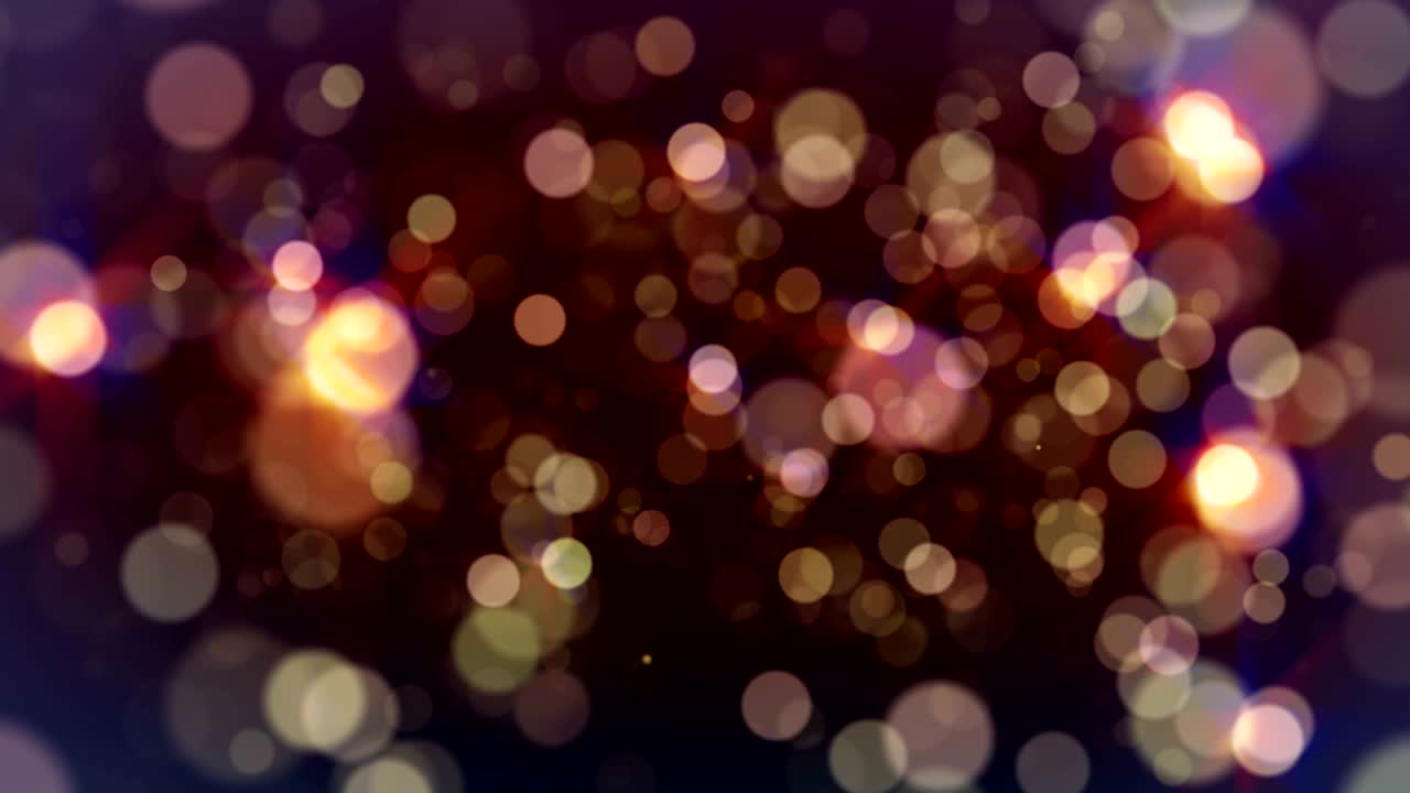 las partículas brillantes iluminan el fondo rojo.