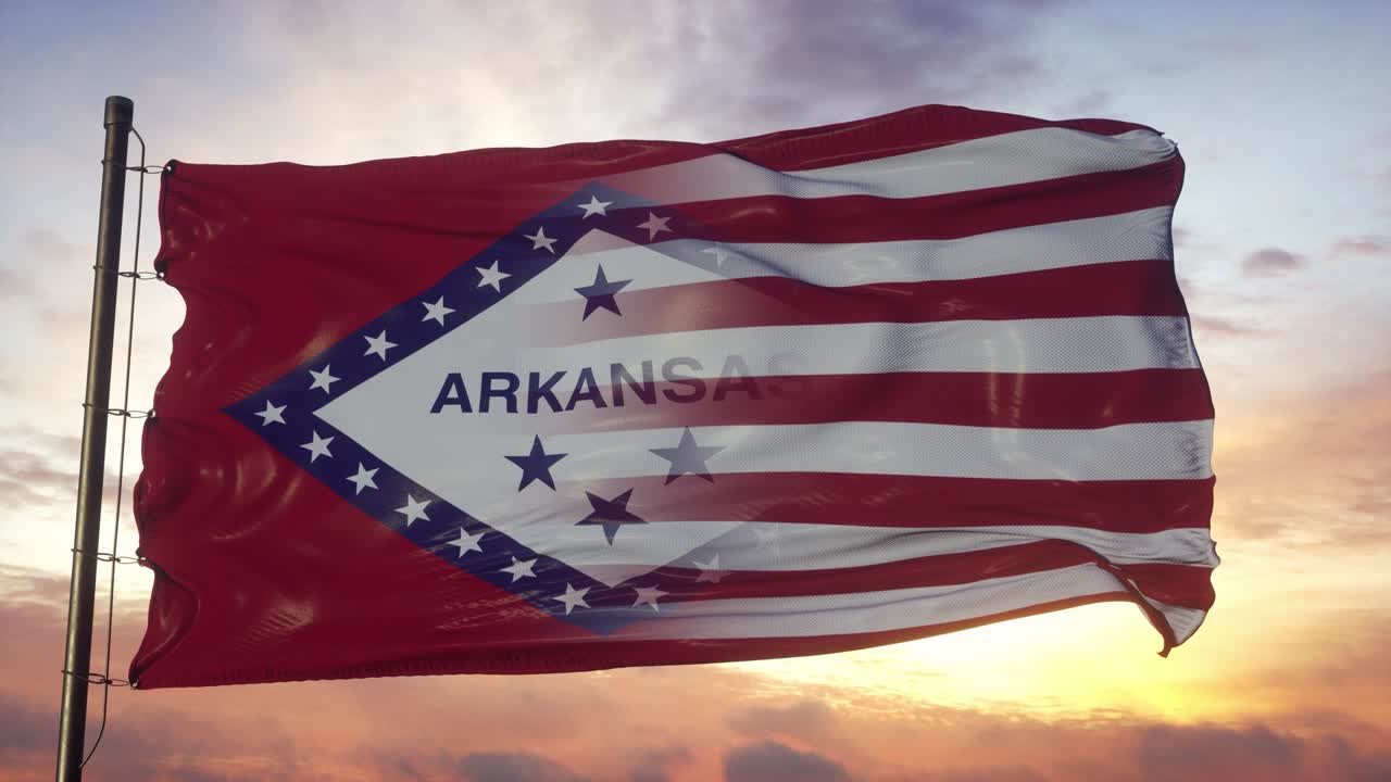 la bandera de arkansas y los estados unidos en el mástil. las banderas mixtas de estados unidos y arkansas ondeando en el viento