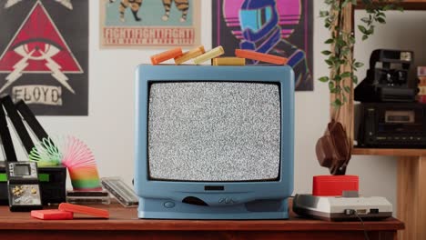 retro gaming room with vintage tv and consoles