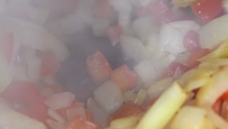 Closeup-of-a-sautè-of-onions-and-red-pepper