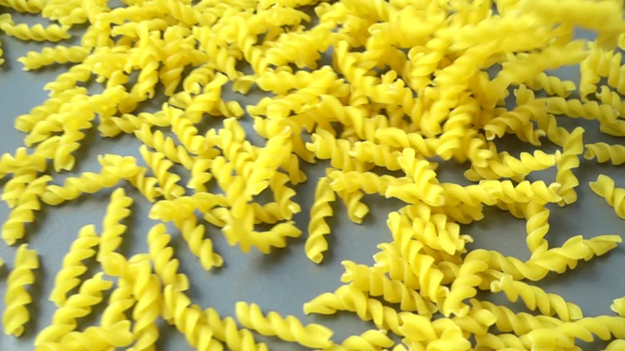 The falling fusilli pasta. Slow motion
