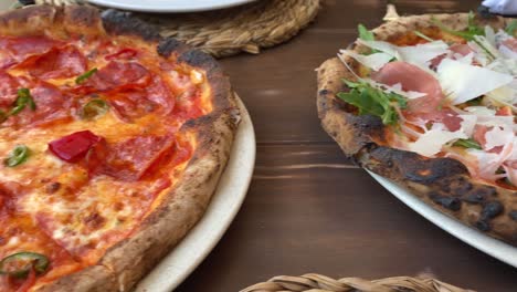 neapolitan stone oven-baked pizzas 4k dynamic moving shot in an italian restaurant