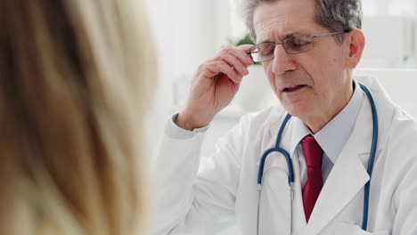 Handheld-video-of-doctor-discussing-with-his-patient