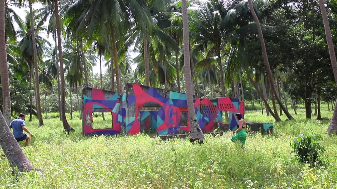 A couple goes on an urban exploration mission in the middle of the jungle in Koh Phangan.