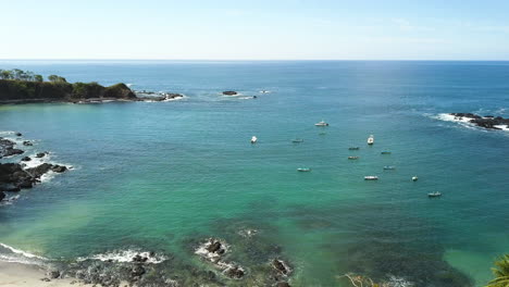 Boats-floating-in-a-beautiful-tropical-bay