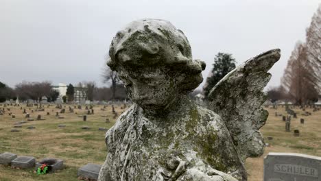 angel on top of gravestone