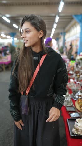 young woman at a market