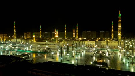 night to day morning transition time-lapse looking over the al masjid al abawi mosque in medina.