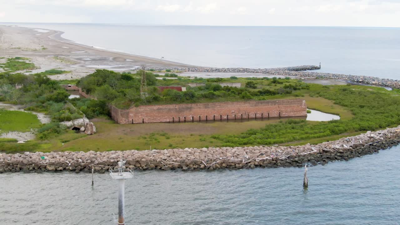 Aerial medium shot of Fort Livingston on Isle Grand Terre in Grand Isle, Louisiana. Fort Livingston is the only fort on the Gulf of Mexico in the state