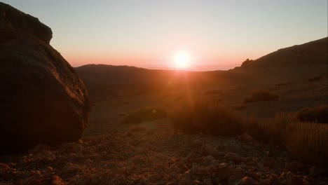 Sunrise-above-clouds-in-volcanic-landscape-on-Tenerife,-Canary-Islands-in-spring