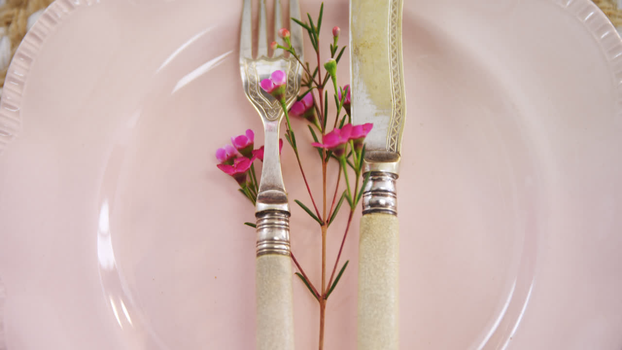 Various cutlery on wooden table 4k