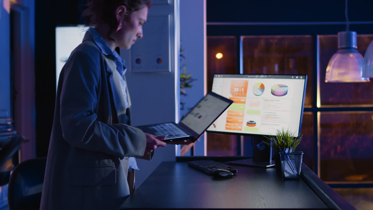 Businesswoman analyzing data in office