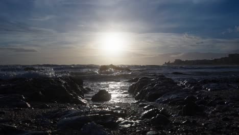 sun shining over the ocean waves