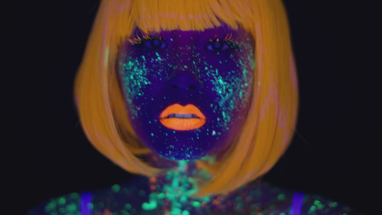 Woman with Fluorescent Makeup and Orange Hair