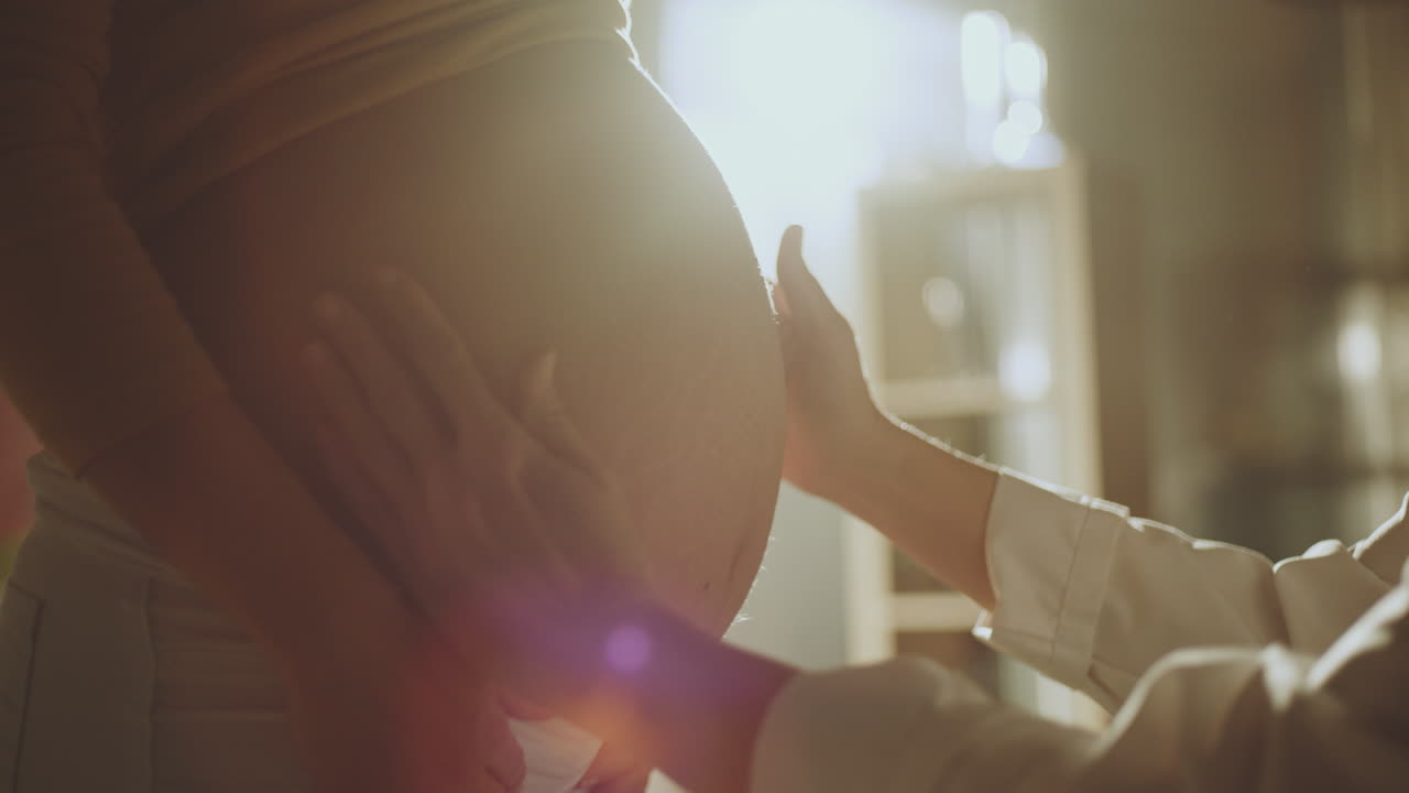 Tender Moments with a Pregnant Belly