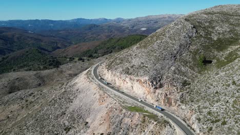 Cars-driving-Scenic-Route-from-Marbella-to-Ronda-in-Andalusia,-Spain---Aerial