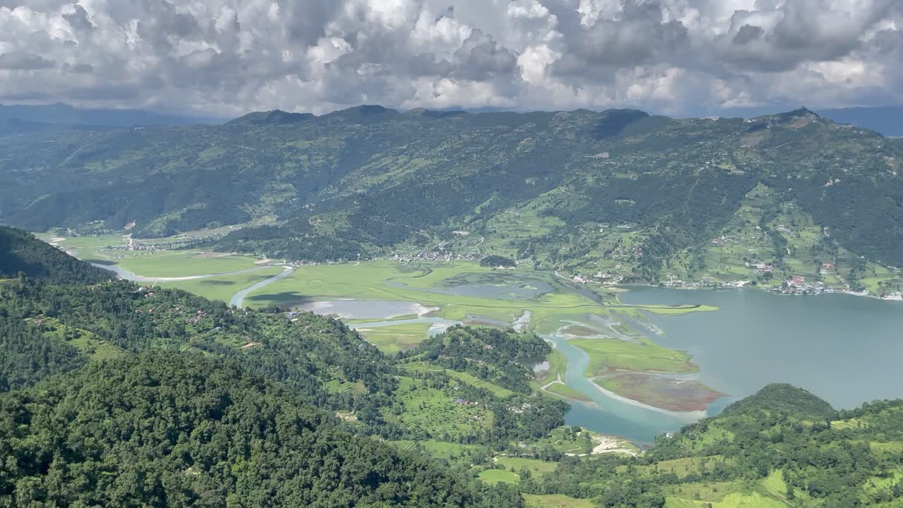 4K Video of a Valley from a lookout to a river and a dam in Nepal.
