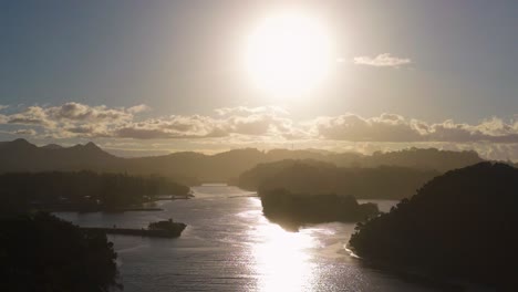a serene sunset over a river in brunswick heads, nsw, australia. warm lighting and tranquil waters create a peaceful atmosphere