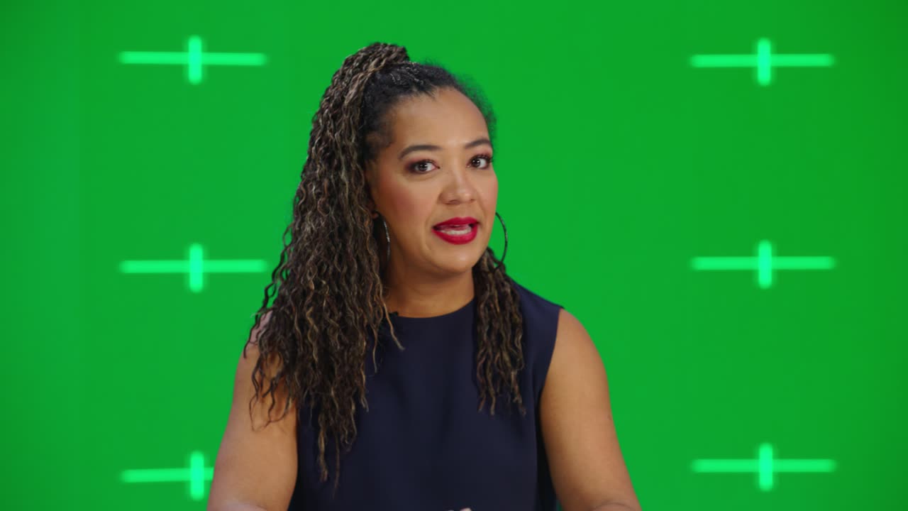 Newsroom TV Studio Live News Program with Green Screen Background: Female Presenter Reporting, Talking. Television Cable Channel Anchorwoman. Network Broadcast Mock-up Playback with Tracking Markers