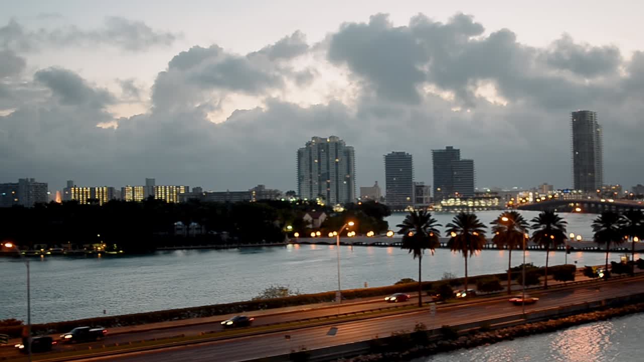 Miami skyline and MacArthur Causeway at dawn as seen from arriving cruise ship.