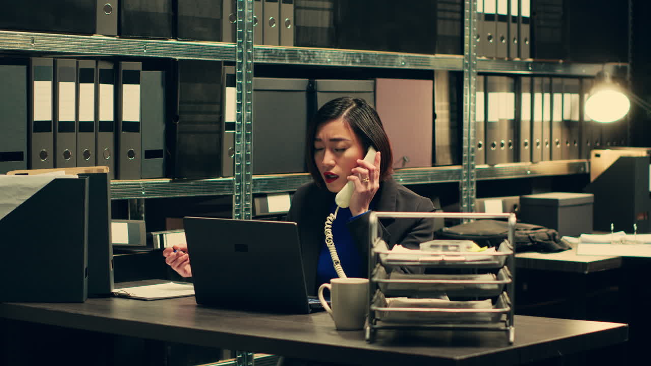 Private detective conducting background check on landline phone call
